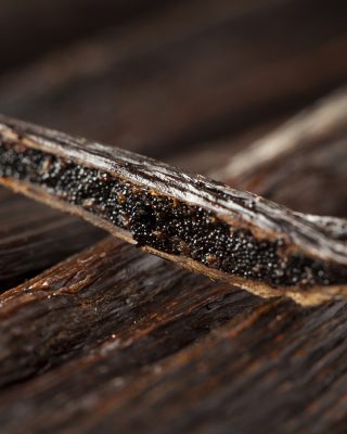 The vanilla bean, along with cacao, originated in the Americas and is now cultivated in several countries around the world. Here, the seeds inside the pod are shown.